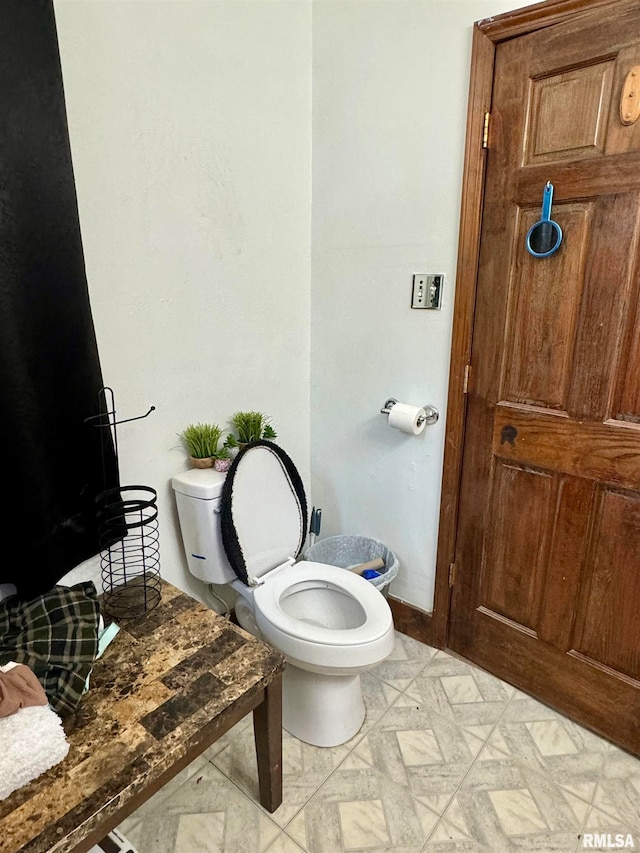 bathroom featuring toilet