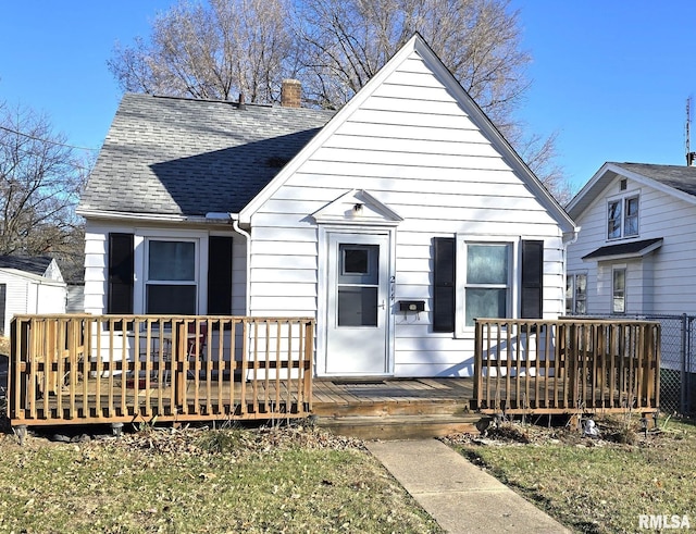 view of front of property featuring a wooden deck