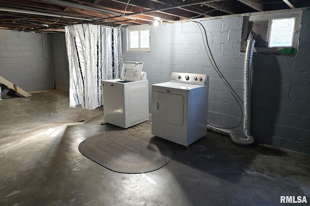 basement featuring washer and clothes dryer