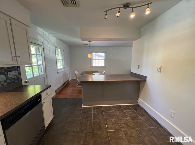 kitchen with white cabinetry, backsplash, kitchen peninsula, stainless steel dishwasher, and a baseboard heating unit