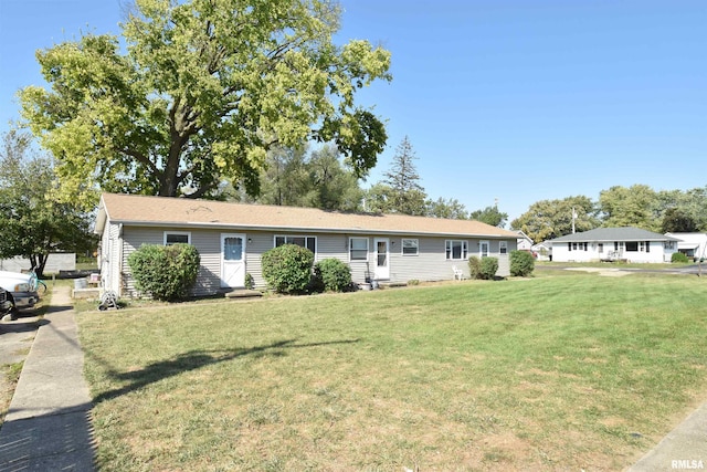 view of front of home with a front yard