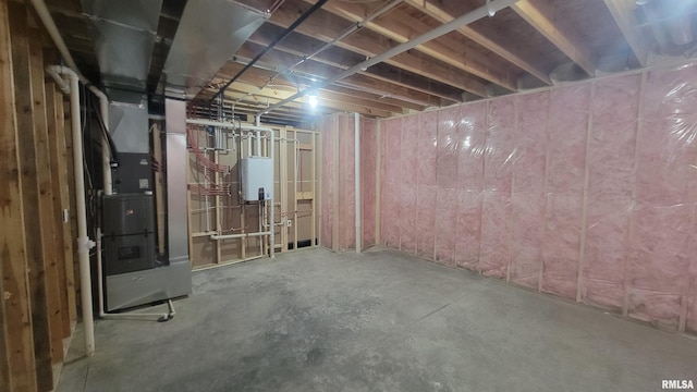 basement featuring heating unit