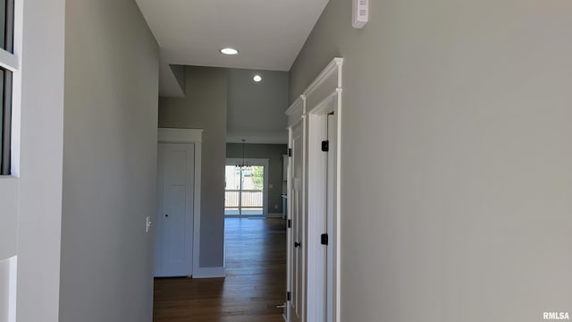 hall with dark hardwood / wood-style floors