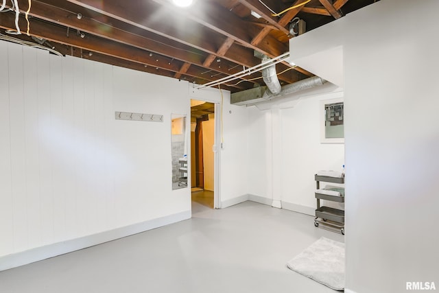 basement with wooden walls