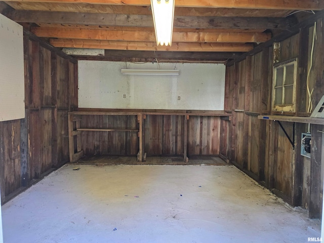 basement with a workshop area