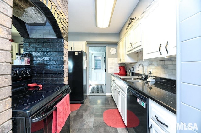 kitchen with white cabinetry, black appliances, and sink