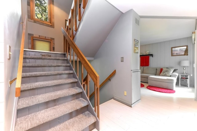 stairway featuring hardwood / wood-style floors