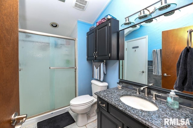 bathroom featuring tile patterned floors, a shower with door, vanity, vaulted ceiling, and toilet