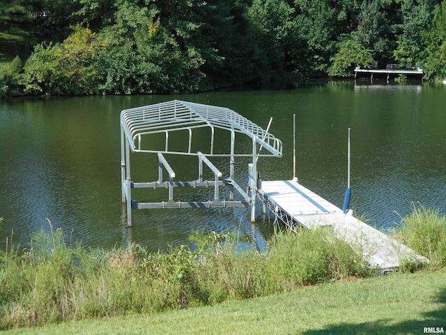 dock area featuring a water view