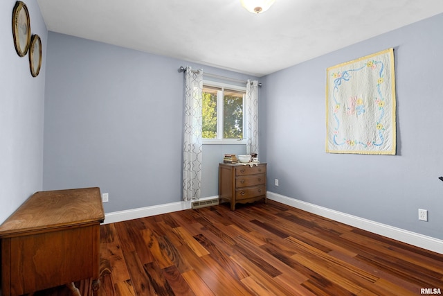 interior space with dark hardwood / wood-style floors