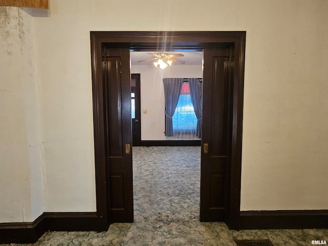 corridor with carpet floors