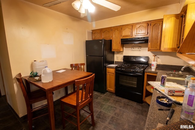 kitchen featuring ceiling fan, sink, and black appliances