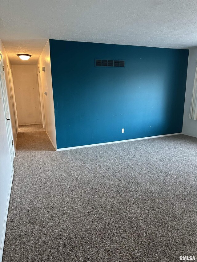 unfurnished room featuring dark hardwood / wood-style flooring