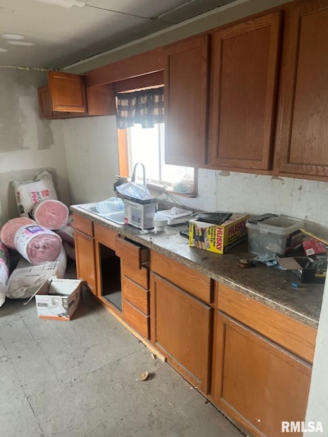 kitchen featuring concrete flooring