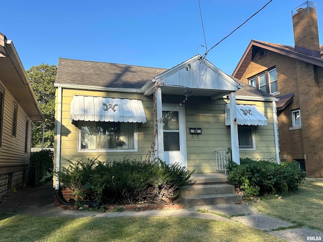 bungalow with a front yard