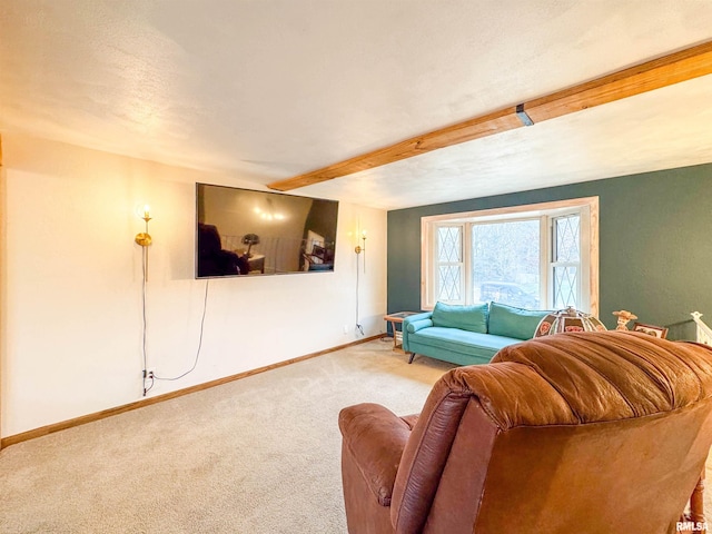 living room featuring carpet flooring, a textured ceiling, and beam ceiling