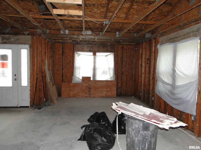 misc room with concrete flooring