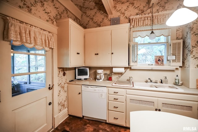 kitchen featuring sink, white dishwasher, hanging light fixtures, white cabinetry, and beam ceiling