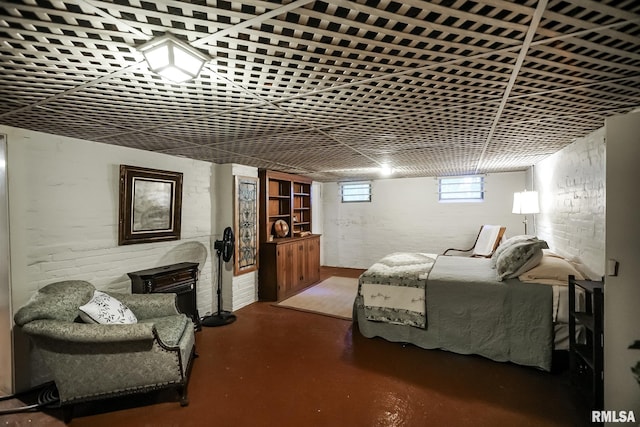 bedroom featuring concrete floors