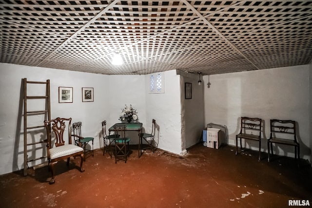 sitting room with concrete flooring