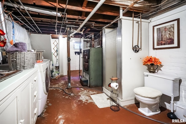 basement featuring washing machine and dryer