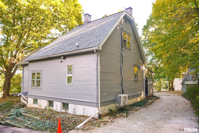 view of property exterior with ac unit