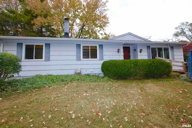 ranch-style house with a front yard