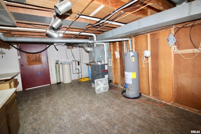 basement with water heater and heating unit