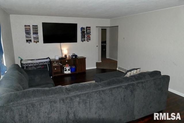 living room with dark wood-type flooring