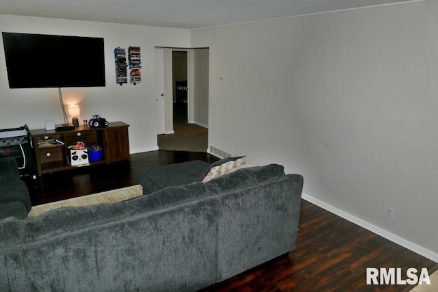 living room with dark wood-type flooring