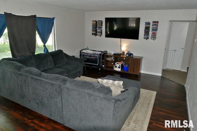 living room with dark wood-type flooring