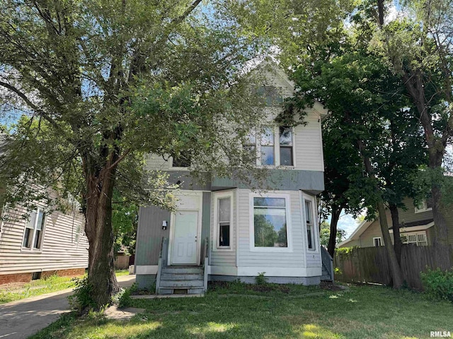 view of front of house with a front lawn