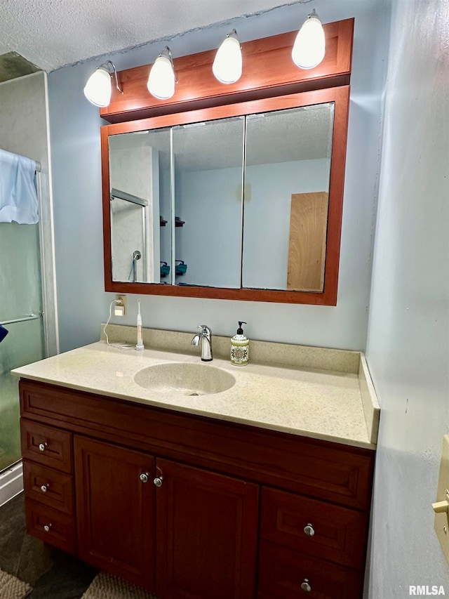 bathroom with vanity and tile patterned flooring