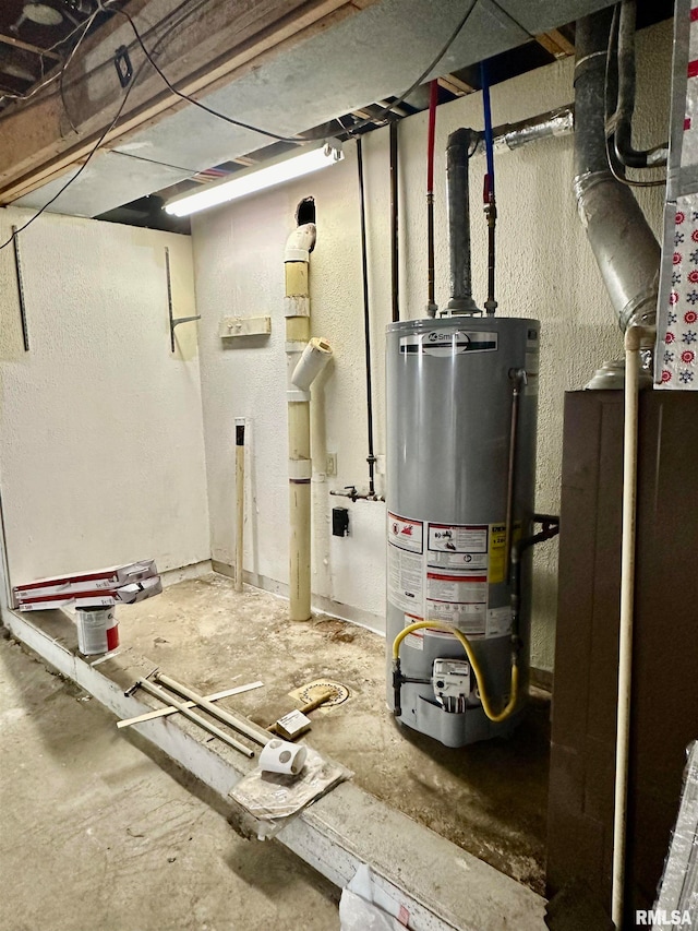 utility room featuring gas water heater