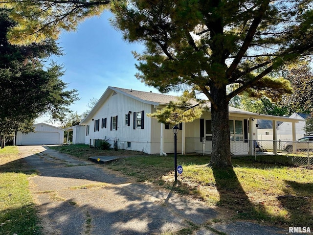 view of front of house with an outbuilding and a garage