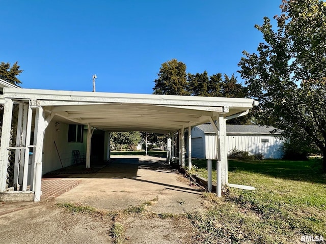 view of parking with a yard and a carport