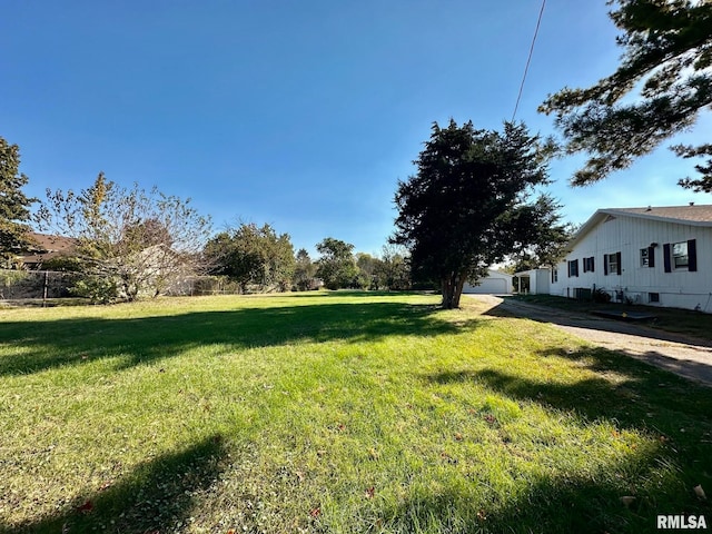 view of yard featuring a garage