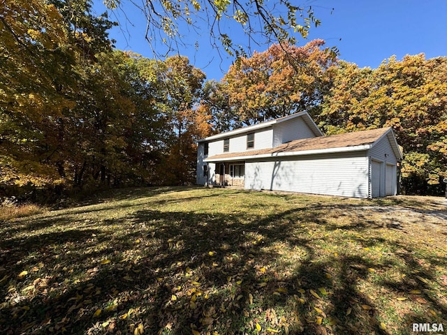 view of property exterior with a yard