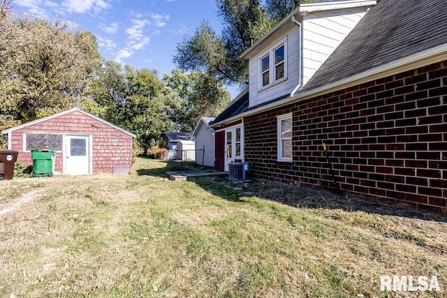 view of yard with central AC unit