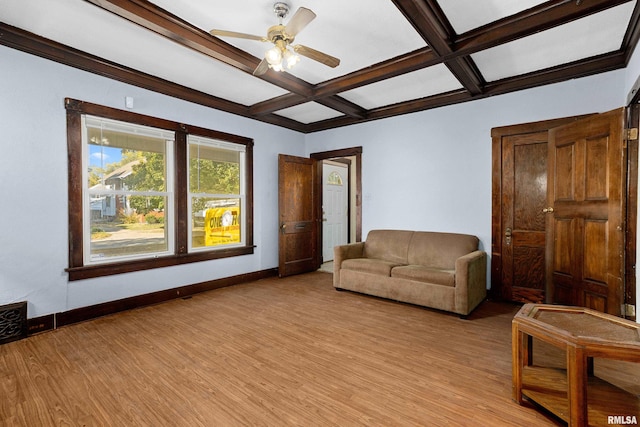 living room featuring light hardwood / wood-style floors, coffered ceiling, beam ceiling, and ceiling fan