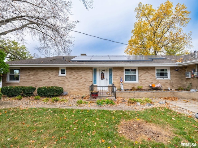 single story home with solar panels