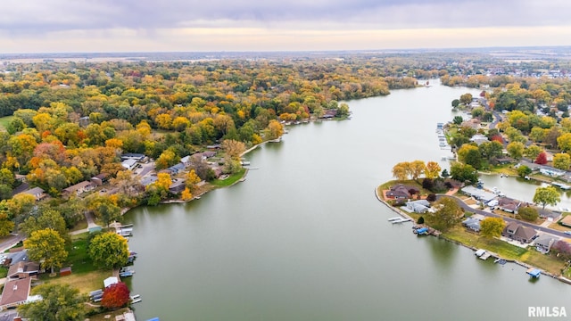 aerial view at dusk with a water view