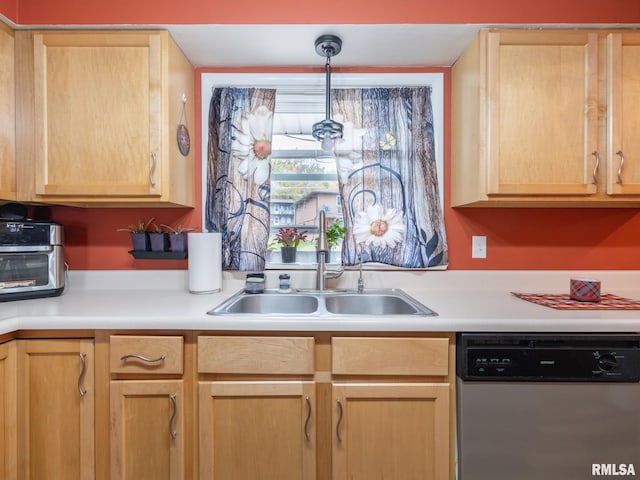 kitchen featuring sink, stainless steel dishwasher, and light brown cabinets