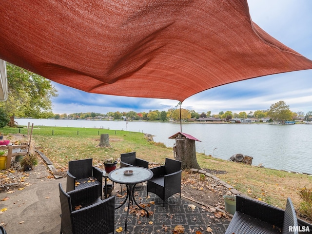 view of patio / terrace with a water view