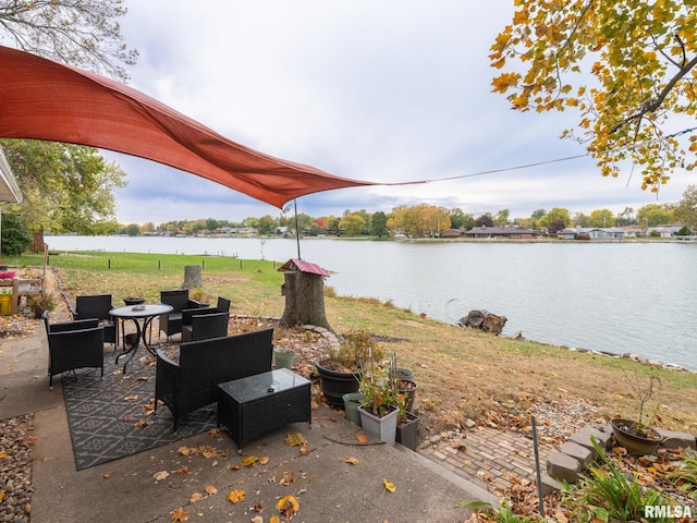 view of patio / terrace with a water view