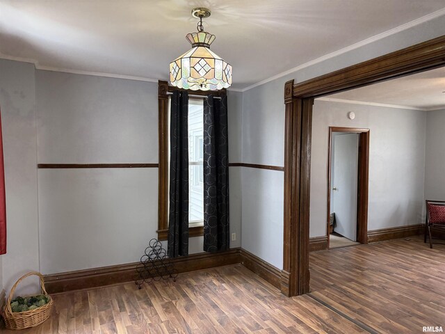 hall featuring crown molding and dark hardwood / wood-style floors