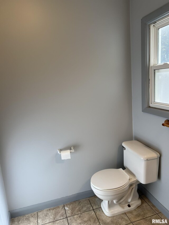 carpeted spare room with plenty of natural light