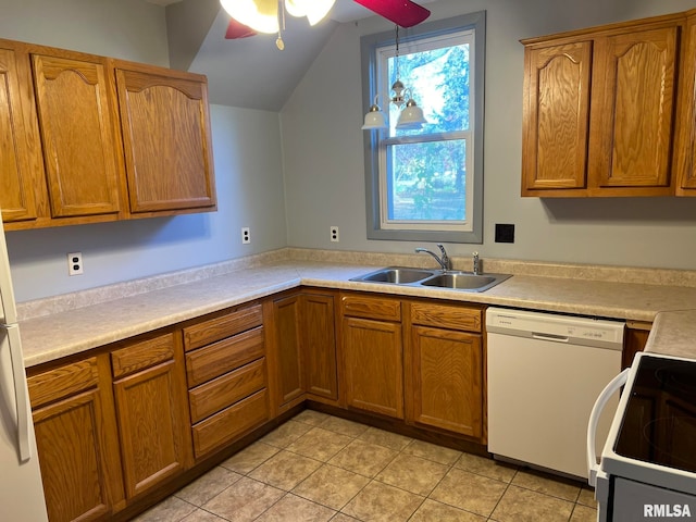 kitchen featuring sink, white dishwasher, ceiling fan, decorative light fixtures, and stove