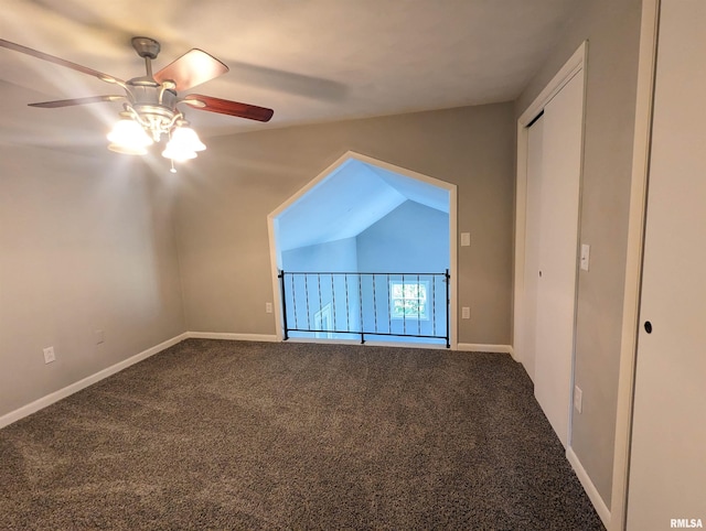 bonus room with a ceiling fan, carpet, lofted ceiling, and baseboards