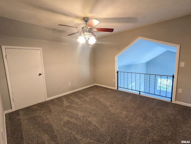 additional living space featuring ceiling fan, baseboards, vaulted ceiling, and carpet flooring